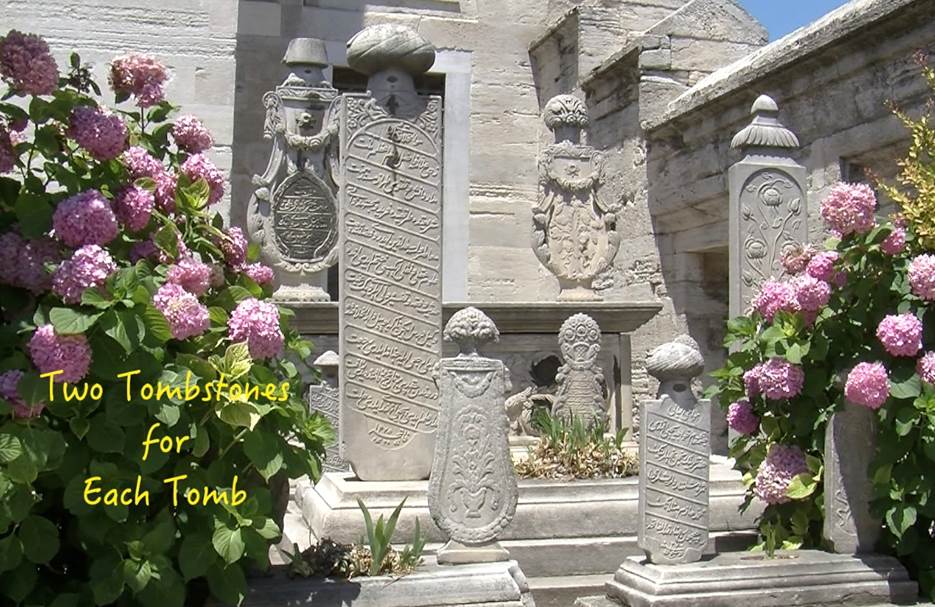 A picture containing outdoor, building, grave, plant Description automatically generated