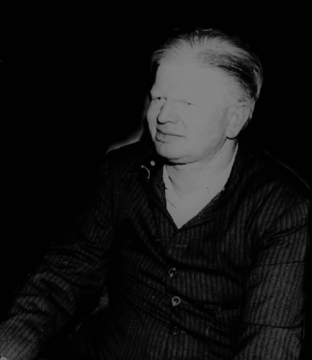 A person in a dark room AI-generated content may be incorrect.
