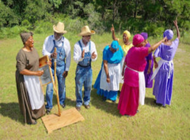 A group of people standing in a field AI-generated content may be incorrect.