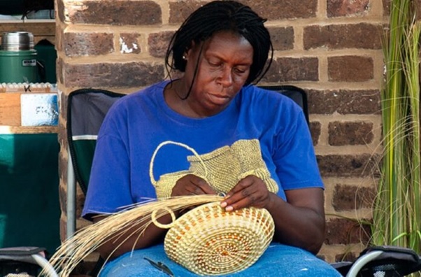 A person sitting in a chair knitting AI-generated content may be incorrect.
