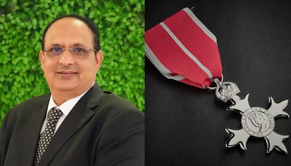 British Pakistani charity worker Ehsan Shahid Choudhry (left) receives British Empire Medal (BEM) medal. &mdash; Provided by the reporter