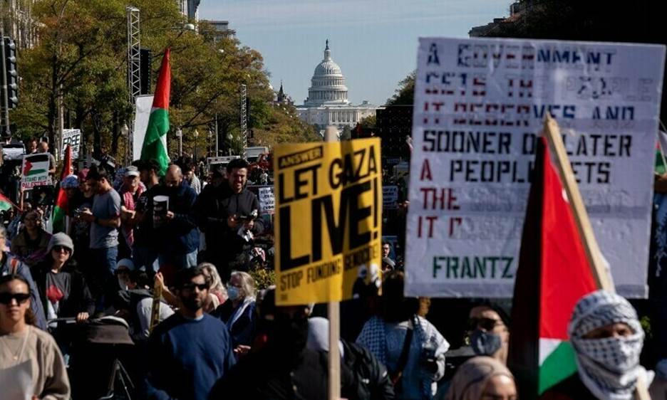 The US Capitol building is seen in the distance as demonstrators gather in Freedom Plaza during a rally in support of Palestinians in Washington, DC, on November 4, 2023. &mdash; AFP
