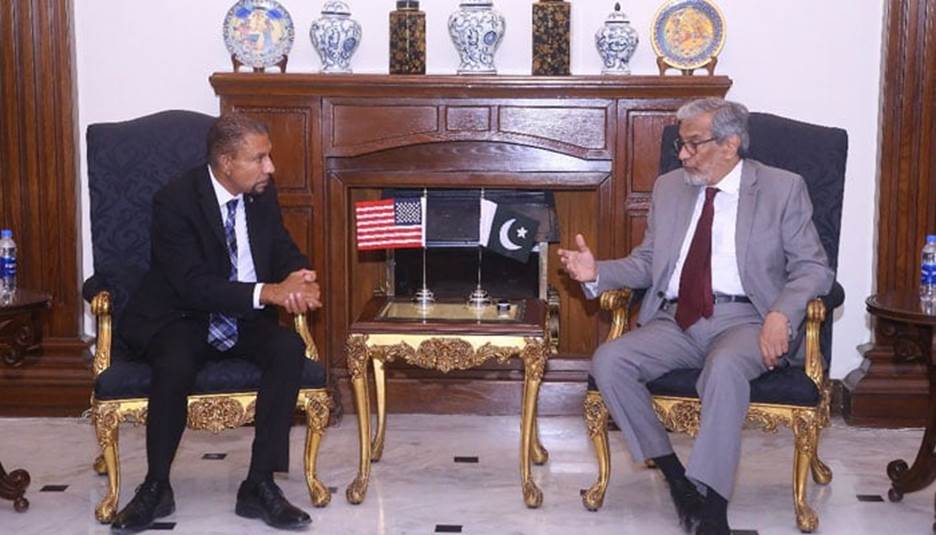 New York State Assembly Deputy Speaker Phil Ramos (left) meets Sindh Caretaker Chief Minister Justice (retd) Maqbool Baqar. &mdash; Supplied