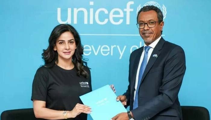 Actor Saba Qamar receives a certificate after her appointment as National Ambassador for Child Rights in Pakistan from the funds country representative Abdullah Fadil on Thursday. &mdash;Unicef