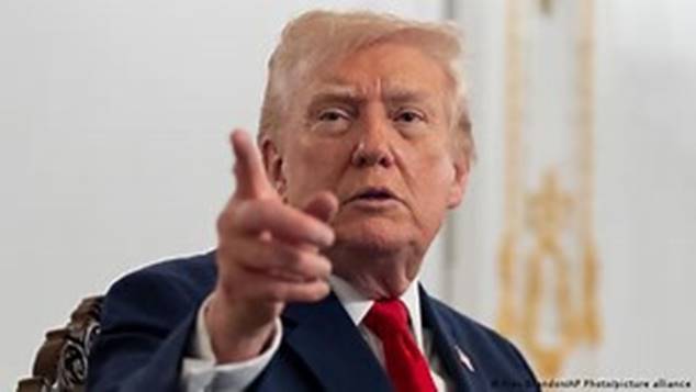 A person in a suit pointing his finger AI-generated content may be incorrect.