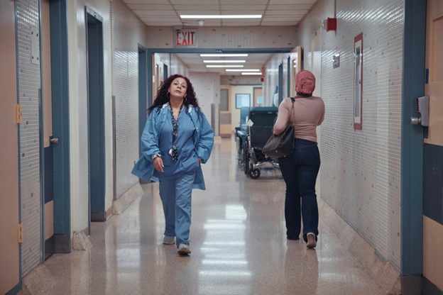 A person walking in a hallway AI-generated content may be incorrect.
