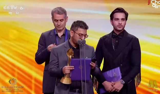 A group of men standing on stage AI-generated content may be incorrect.