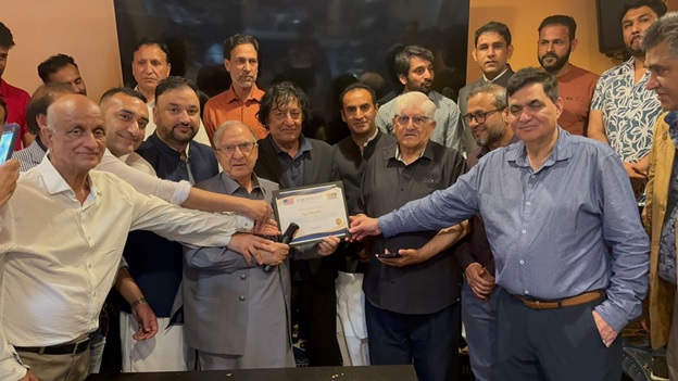 A group of men holding a certificate AI-generated content may be incorrect.