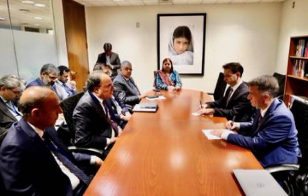 A group of people sitting around a table AI-generated content may be incorrect.