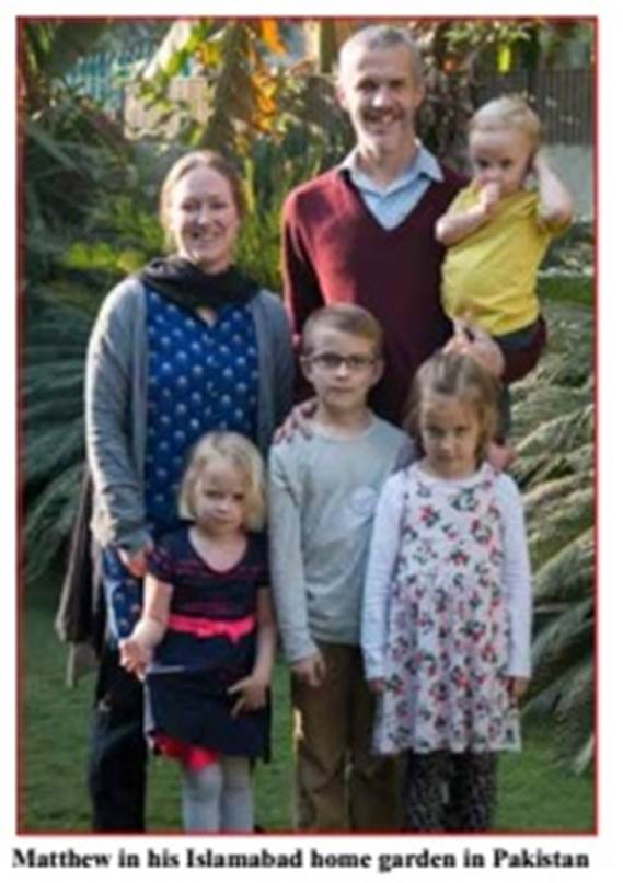 A group of people posing for a photo Description automatically generated