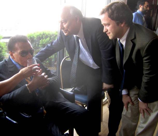 A group of men in suits AI-generated content may be incorrect.