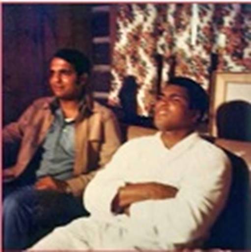 A group of men sitting on a couch AI-generated content may be incorrect.