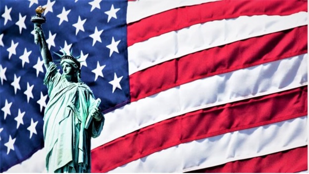 A statue of a person in front of a flag AI-generated content may be incorrect.
