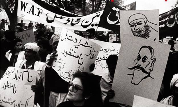 A group of people holding signs AI-generated content may be incorrect.